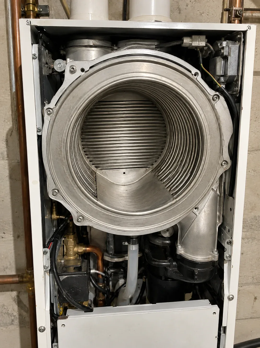 Boiler cleaning Toronto — heat exchanger before cleaning, with visible deposits
